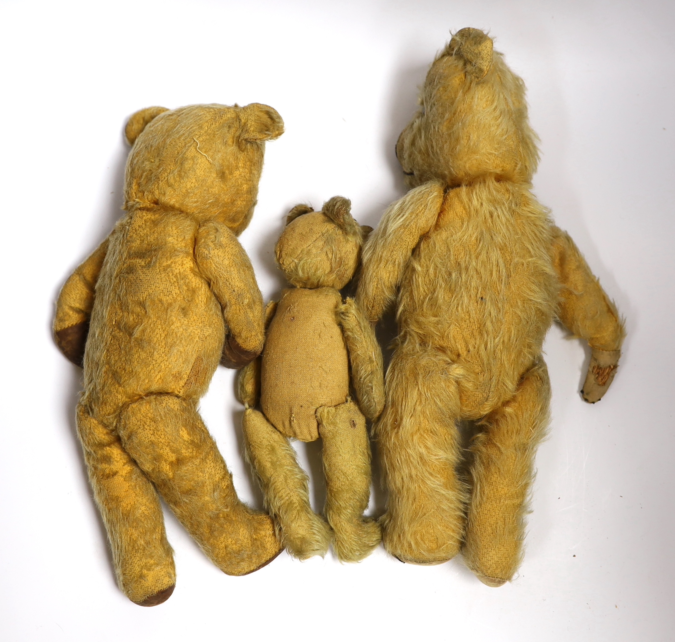 A 1930's Chiltern, damage to paw, a Chiltern type bear and a 1930's bear (3)